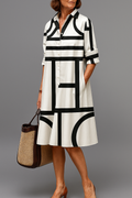 Ellie | Black and White Elegant Midi Dress